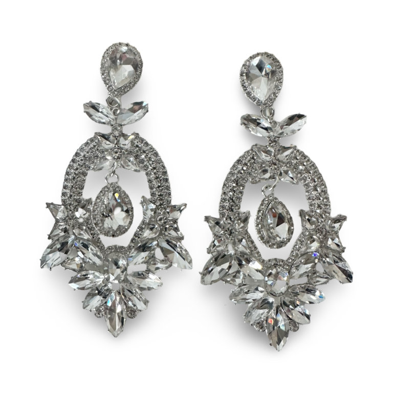 a pair of silver earrings with diamonds
