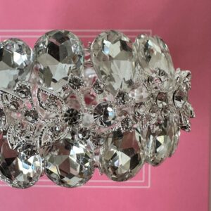 a bracelet with large crystals on it