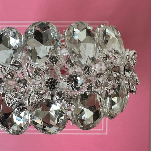 a bracelet with large crystals on it